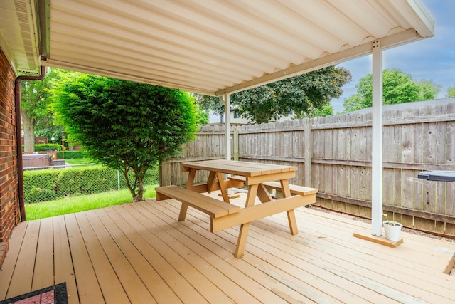 203 S Hershey Rd, Bloomington, IL 61704 - wooden terrace featuring a fenced backyard