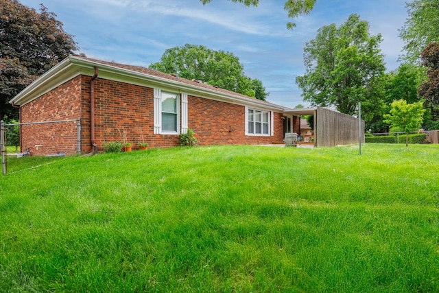 203 S Hershey Rd, Bloomington, IL 61704 - back of property featuring brick siding