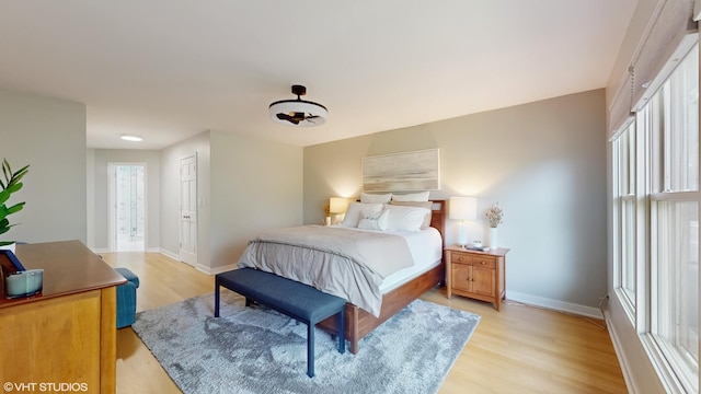 14352 Crystal Tree Dr, Orland Park, IL 60462 - bedroom featuring light wood-style floors and baseboards