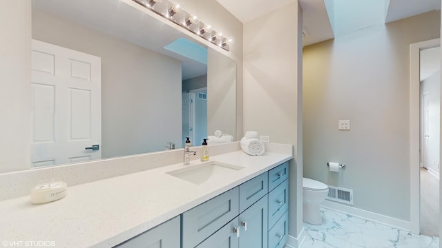 14352 Crystal Tree Dr, Orland Park, IL 60462 - bathroom featuring marble look tiles, vanity, toilet, and baseboards