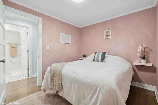 4428 N Racine Ave Unit Gn, Chicago, IL 60640 - bedroom featuring wood finished floors, baseboards, ornamental molding, and connected bathroom
