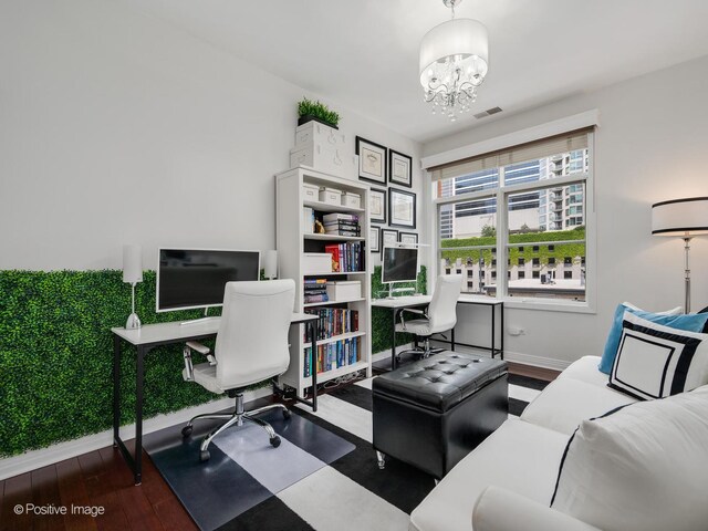550 W Fulton St Unit 404, Chicago, IL 60661 - home office with a chandelier, baseboards, and wood finished floors