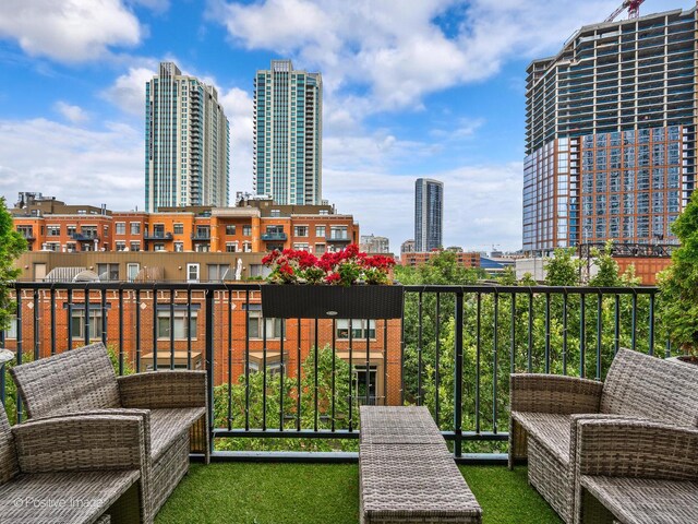 550 W Fulton St Unit 404, Chicago, IL 60661 - balcony with a skyline view