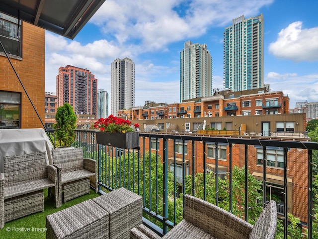 550 W Fulton St Unit 404, Chicago, IL 60661 - balcony featuring a view of skyline