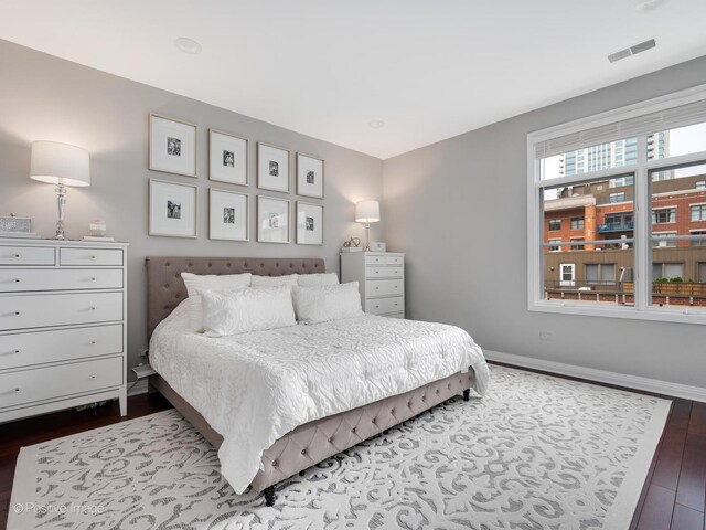 550 W Fulton St Unit 404, Chicago, IL 60661 - bedroom featuring dark wood-style flooring and baseboards