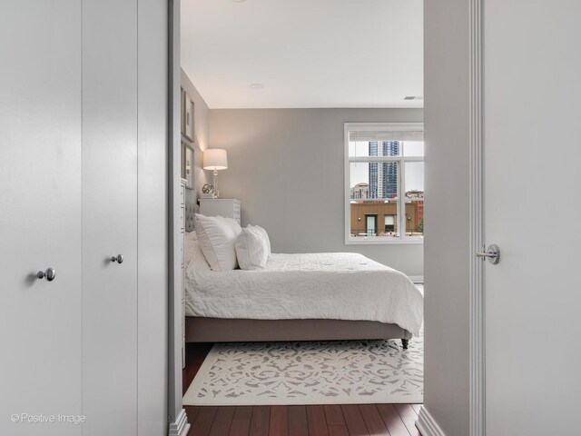 550 W Fulton St Unit 404, Chicago, IL 60661 - bedroom featuring wood finished floors and baseboards