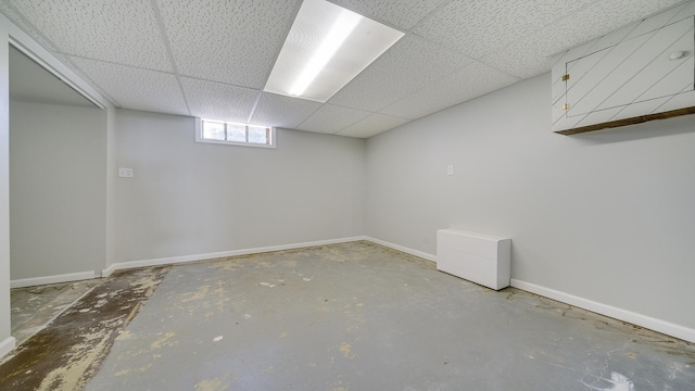325 Goodrich St, Belvidere, IL 61008 - basement with baseboards and a paneled ceiling