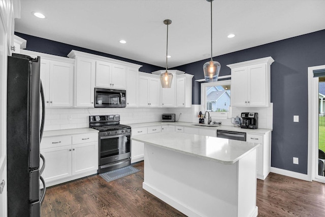1407 Winterberry Rd, Savoy, IL 61874 - kitchen with black appliances, tasteful backsplash, white cabinets, dark wood-type flooring, and decorative light fixtures