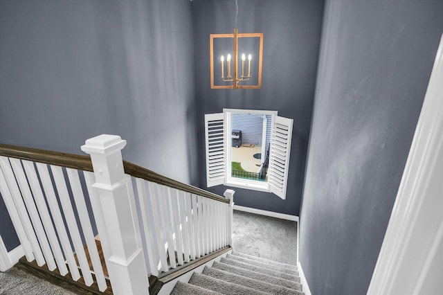 1407 Winterberry Rd, Savoy, IL 61874 - staircase with a chandelier and carpet floors