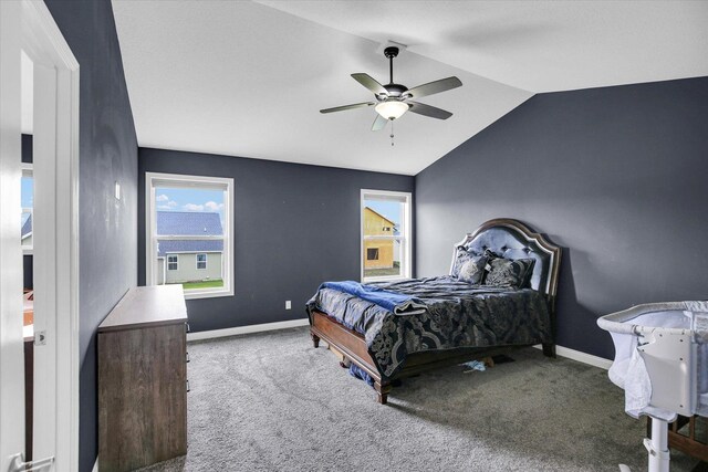 1407 Winterberry Rd, Savoy, IL 61874 - bedroom featuring carpet flooring, vaulted ceiling, and a ceiling fan