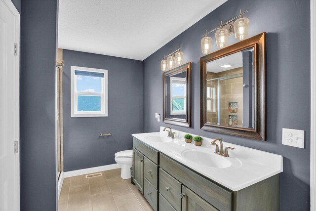 1407 Winterberry Rd, Savoy, IL 61874 - bathroom featuring double vanity and a shower stall