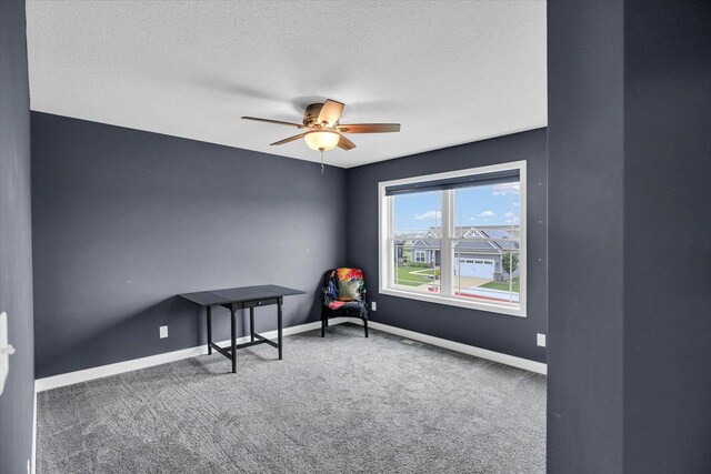 1407 Winterberry Rd, Savoy, IL 61874 - sitting room with carpet flooring, ceiling fan, and a textured ceiling