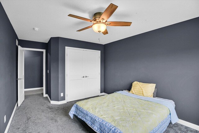 1407 Winterberry Rd, Savoy, IL 61874 - bedroom with carpet floors, a closet, and a ceiling fan