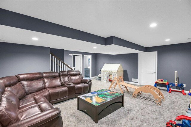1407 Winterberry Rd, Savoy, IL 61874 - living area with carpet floors, recessed lighting, and stairway