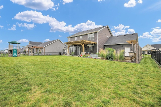 1407 Winterberry Rd, Savoy, IL 61874 - back of house featuring a fenced backyard and a playground
