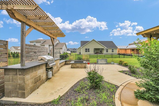 1407 Winterberry Rd, Savoy, IL 61874 - view of patio / terrace featuring area for grilling, a pergola, a fire pit, and a residential view