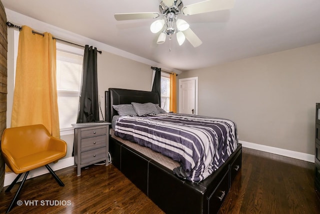 221 Cornwall Dr, Crete, IL 60417 - bedroom with baseboards, dark wood-type flooring, and ceiling fan