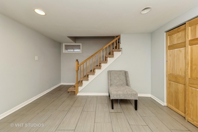 221 Cornwall Dr, Crete, IL 60417 - unfurnished room featuring recessed lighting, baseboards, stairs, and light wood finished floors