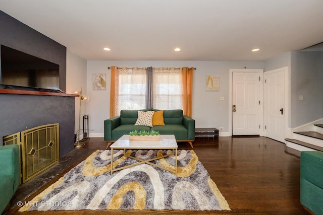 221 Cornwall Dr, Crete, IL 60417 - living area featuring wood finished floors, stairway, a fireplace with flush hearth, recessed lighting, and baseboards