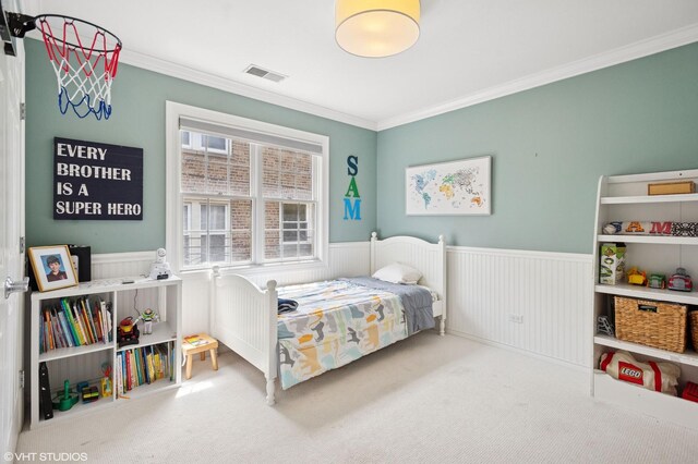 3414 N Bell Ave, Chicago, IL 60618 - carpeted bedroom featuring wainscoting and crown molding