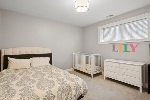 3414 N Bell Ave, Chicago, IL 60618 - bedroom with light carpet and baseboards