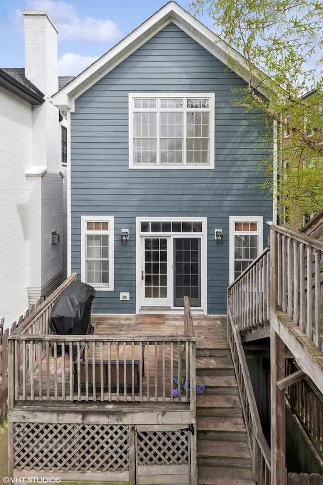 3414 N Bell Ave, Chicago, IL 60618 - rear view of property with stairs and a wooden deck