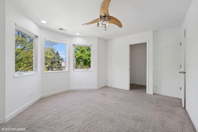 877 Hollywood Ave, Des Plaines, IL 60016 - unfurnished bedroom with baseboards, light carpet, recessed lighting, and a ceiling fan