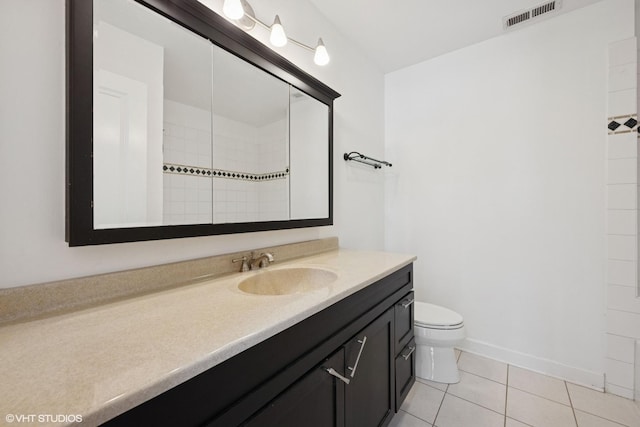 877 Hollywood Ave, Des Plaines, IL 60016 - bathroom featuring vanity, tile patterned floors, and toilet
