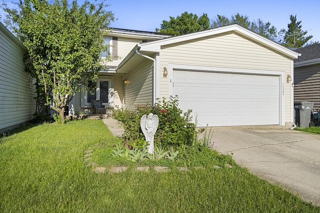 16203 Fox Ct, Orland Hills, IL 60487 - view of front of property featuring concrete driveway, a garage, and a front yard