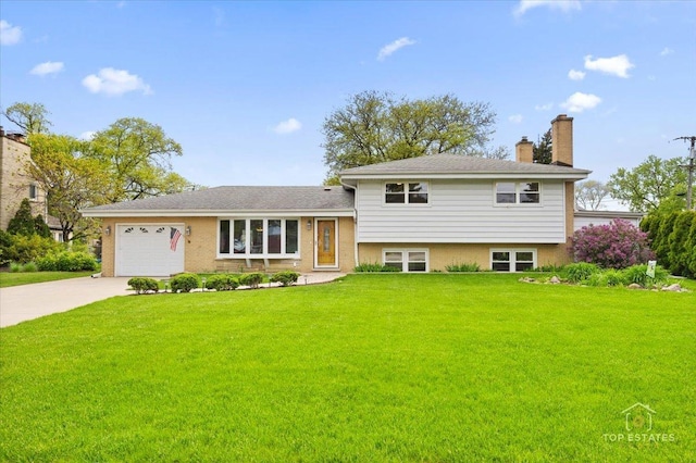 9258 Clancy Dr, Des Plaines, IL 60016 - tri-level home with driveway, a chimney, a front yard, and a garage