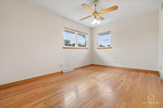 9258 Clancy Dr, Des Plaines, IL 60016 - spare room with light wood-style flooring, baseboards, and a ceiling fan