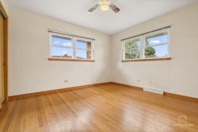 9258 Clancy Dr, Des Plaines, IL 60016 - unfurnished bedroom featuring light wood-style floors, baseboards, and a closet