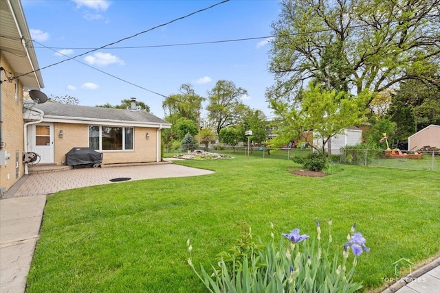 9258 Clancy Dr, Des Plaines, IL 60016 - view of yard with a patio area