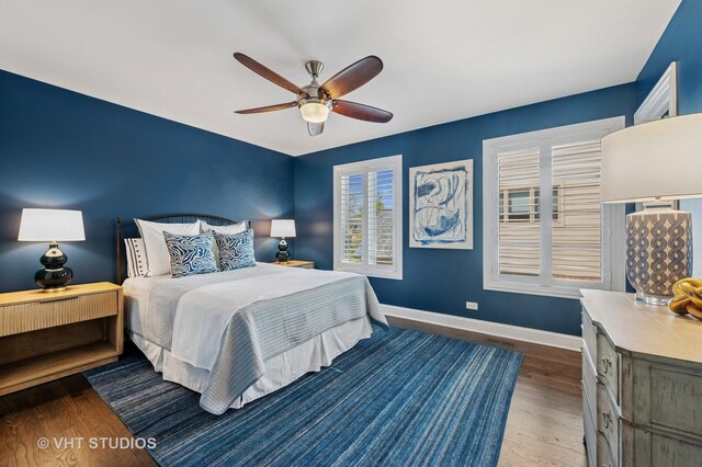 3118 Oliver Ln, Northbrook, IL 60062 - bedroom featuring baseboards, wood finished floors, and a ceiling fan