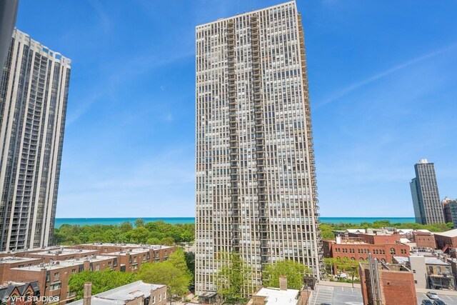 1636 N Wells St Unit 1107, Chicago, IL 60614 - view of building exterior with a water view and a view of city