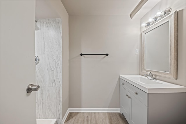 502 Antietam St, Park Forest, IL 60466 - full bath featuring a shower, vanity, wood finished floors, and baseboards