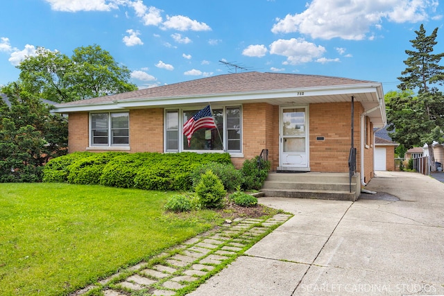 782 S Bryan St, Elmhurst, IL 60126 - view of front of house with brick siding, a front yard, concrete driveway, and a shingled roof