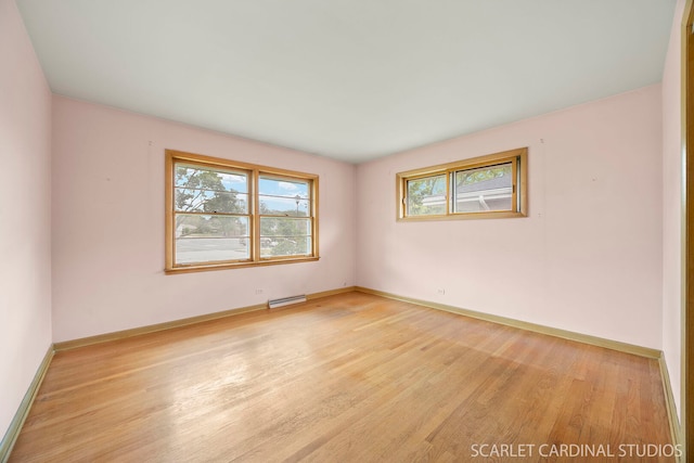 782 S Bryan St, Elmhurst, IL 60126 - unfurnished room featuring healthy amount of natural light, light wood-style flooring, and baseboards