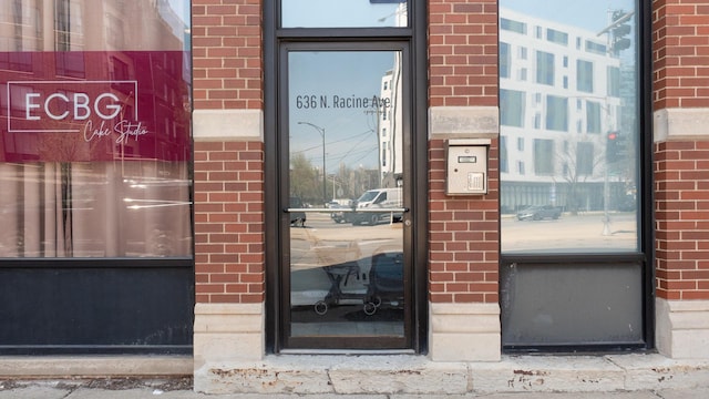636 N Racine Ave Unit 2N, Chicago, IL 60642 - property entrance featuring brick siding