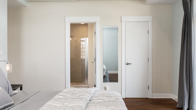 636 N Racine Ave Unit 2N, Chicago, IL 60642 - bedroom with wood finished floors, baseboards, and ensuite bath