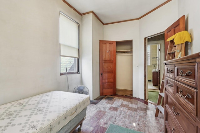 3754 W Sunnyside Ave, Chicago, IL 60625 - bedroom with ornamental molding and a closet