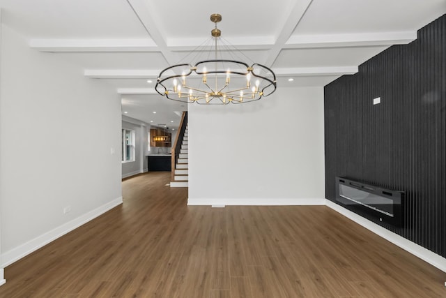 8114 S Paxton Ave, Chicago, IL 60617 - unfurnished dining area featuring a chandelier, wood finished floors, stairs, baseboards, and beam ceiling