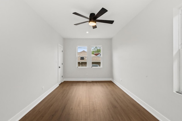 8114 S Paxton Ave, Chicago, IL 60617 - spare room featuring dark wood-style floors, a ceiling fan, baseboards, and recessed lighting