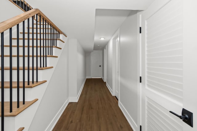8114 S Paxton Ave, Chicago, IL 60617 - corridor featuring dark wood-style floors, baseboards, stairway, and recessed lighting