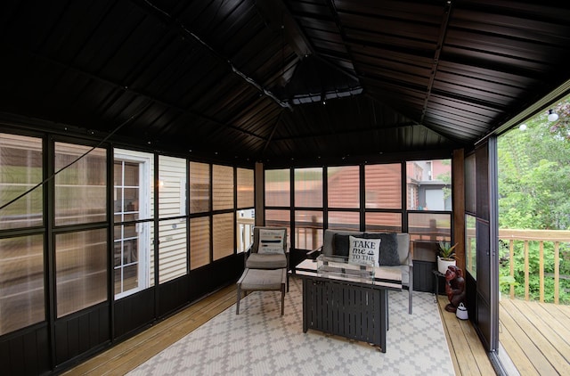 195 Fossil Cove Ln, Wilmington, IL 60481 - sunroom featuring a wooden deck, vaulted ceiling, and hardwood / wood-style flooring