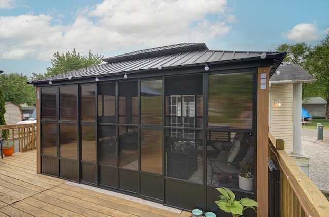 195 Fossil Cove Ln, Wilmington, IL 60481 - deck with a sunroom