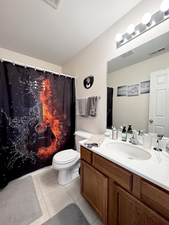 756 Lambert Ln, Bartlett, IL 60103 - bathroom featuring vanity, toilet, and tile patterned floors