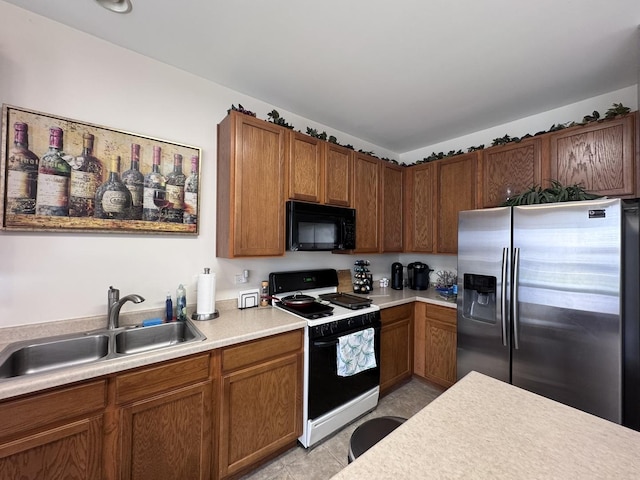 756 Lambert Ln, Bartlett, IL 60103 - kitchen with stainless steel fridge with ice dispenser, black microwave, gas range, a sink, and light countertops