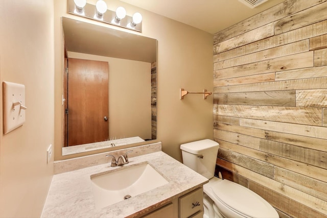 2512 Fox Meadow Dr, Crest Hill, IL 60403 - half bath with wooden walls, toilet, and vanity