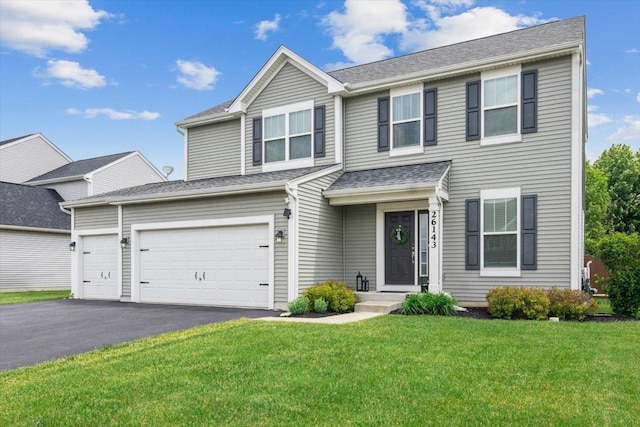 26143 S White Oak Trl, Channahon, IL 60410 - view of front of house with a front yard and driveway
